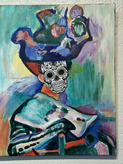 A recreation of a Matisse painting but with the face replaced with a white and black paper skull ornately decorated.