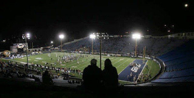 Color image of a fall football game in Northeast Ohio at a college stadium.