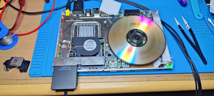 PlayStation2, completely cleaned and with new laser assembly booting a game backup