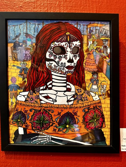 A skeleton in a dress with red hair.