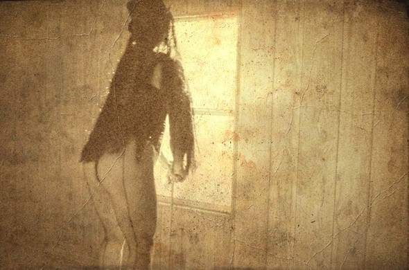 "Seams and Tophat at Window"