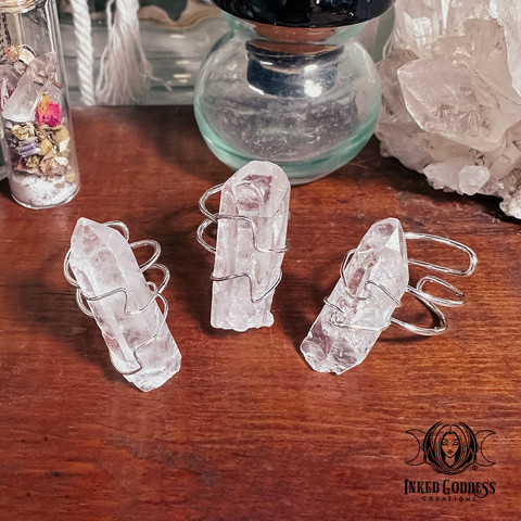 A photo of the "Clear Quartz Adjustable Ring" product from Inked Goddess Creations.