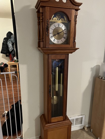 A grandfather clock. Maker unknown.