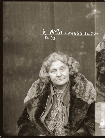 mug shot of Ada McGuiness - an elder woman in furs arrested for dealing cocaine in 1929