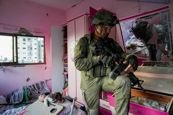 An Israeli soldier stands in an apartment during a ground operation in the Gaza Strip on Wednesday.Credit: Ohad Zwigenberg /AP
Gideon Levy
Nov 12, 2023 12:19 am IST
