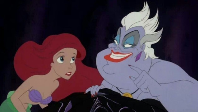 A screenshot featuring Aerial (a redheaded mermaid with a purple clamshell bathing suit) and Ursula (a purple sea witch with white hair, blue eyeshadow, red lipstick, and a black strapless dress).