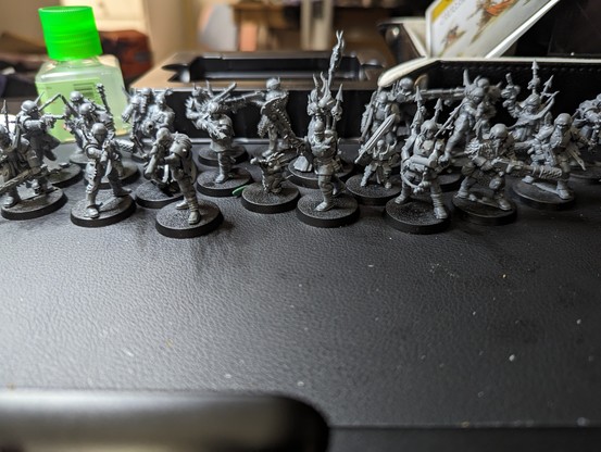 A bunch of warhammer 40k traitor guard models. Unpainted, but mostly assembled. One is missing an arm