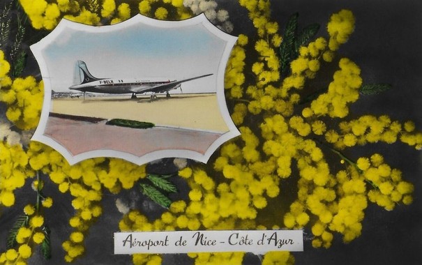 Postcard for the Nice airport - It showes a small picture of an Air France prop plane while the rest of the card is some sort of yellow puffy balled flowers.
