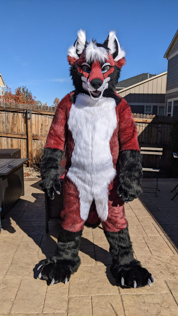 Red, black, and white Fox fullsuit front view