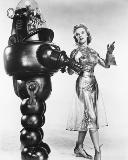 Anne Francis and Robbie the Robot in a publicity still from Forbidden Planet.