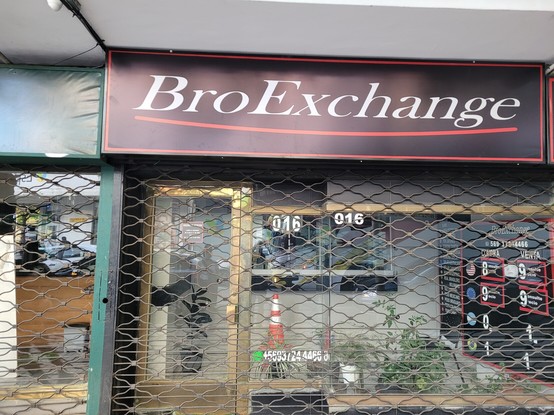 Sign for a shop called BroExchange. Shop is closed.