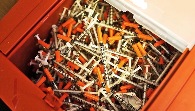 Used syringes viewed at a needle exchange clinic where users can pick up new syringes and other clean items for those dependent on heroin, on February 6, 2014, in St. Johnsbury, Vermont