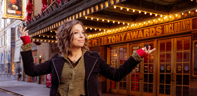 Singer-Sonwriter Ani DiFranco poses in front of the Walter Kerr Theatre where she will join the cast of "Hadestown" in February 2024. Photo by Matthew Murphy