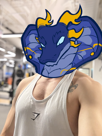 Gym selfie--white tank top and blurred gym background w/ Argent (blue + gold cobra) head overtop of face