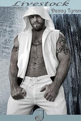 Cover photograph shows a powerfully built bearded man in a sleeveless white hoody.