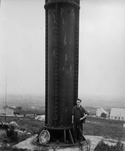 Base of mast 2, Marconi 'Carnarvon' station, showing portal to inside, up which a ladder ran to the top of the 400' iron tube mast. Transmitter station to rear, right.