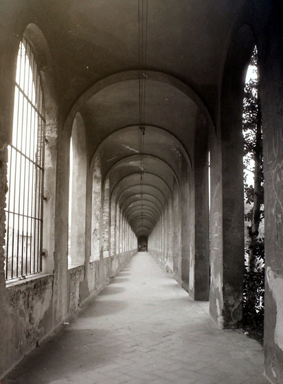 B&W photo of a long corridor