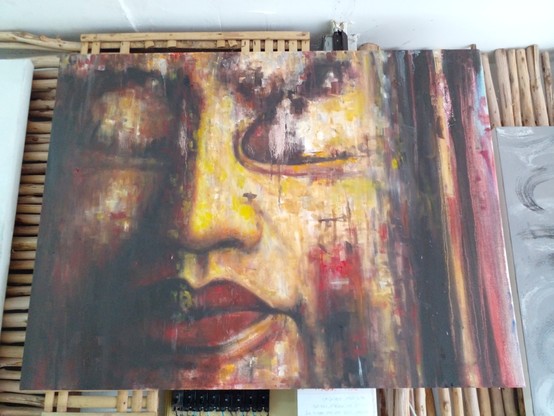 a painting of a face with eyes closed, abstract effects on it