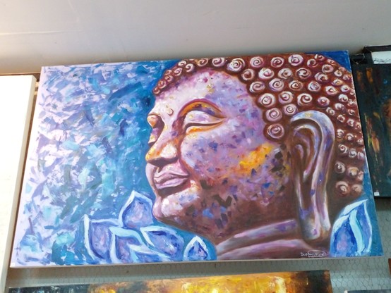 a painting of the Buddhas face looking off to the left side, painting is done with tones of purple and indigo and violet and blue