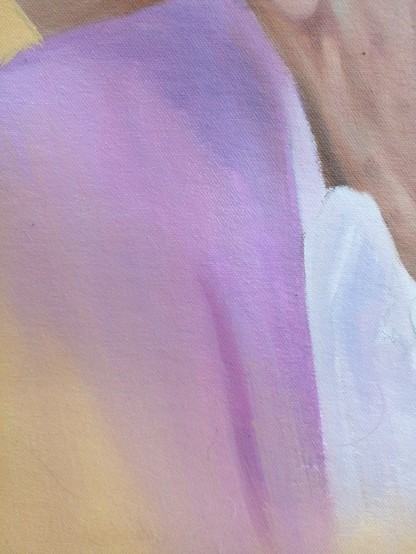a close-up photo of the woman's shoulder , the tones of her lavender colored sweater blending with the naples yellow background color