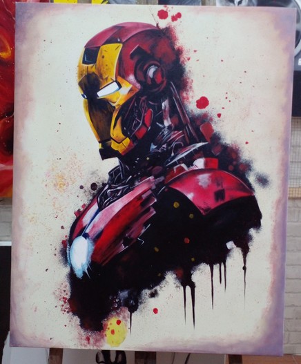 a painting of the chest and shoulders and head of iron man, there are paint splatter effects around him, spray effects, it is done in a street art type of style