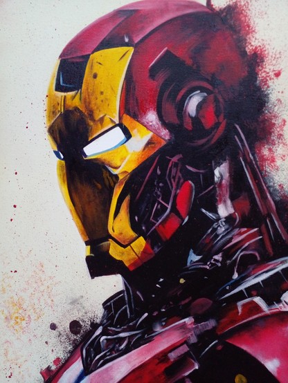 a close-up of Iron Man's head, his eyes glowing white