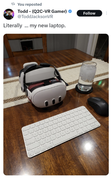 A X/Twitter post by @ToddJacksonVR with a photo captioned "Literally ... my new laptop.", with a photo containing a Meta Quest 3, an Apple Keyboard, and a Logitech Mouse, on a wooden dining room table, with a glass of ice water towards the right