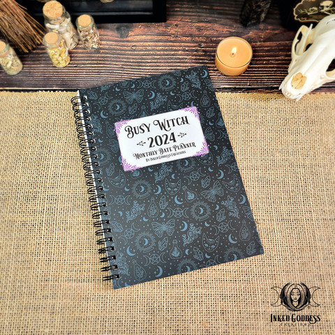 A photo of the exclusive "2024 Busy Witch Monthly Date Planner with Stickers" product from IGC.