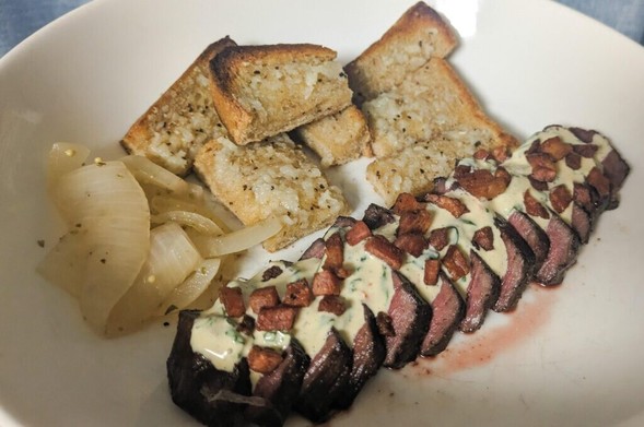 Venison top round steak with garlic bread