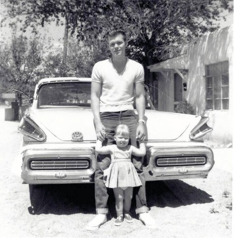 Young Glenn Campbell and child with his 1957 Merc (?) What a legend.