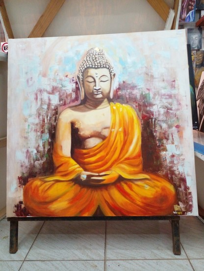 a painting of the Buddha, wearing orange robes, the background is light at the edges and then rust-red dark tones behind him, his eyes are closed , his hands together, he is meditating