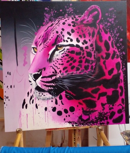 a painting of a leopard, done with bright pink, the background is black at the top, fading into pink and then light pink, there are black spots on the cat, they look intense next to the bright pink, the cat is looking to the left side, its eyes bright amber colored with dark pupils, there are splatter and drip effects on it