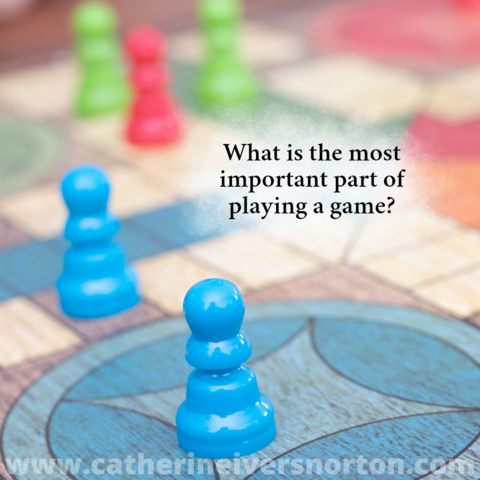 A colorful board game with a caption, "What is the most important part of playing a game?"