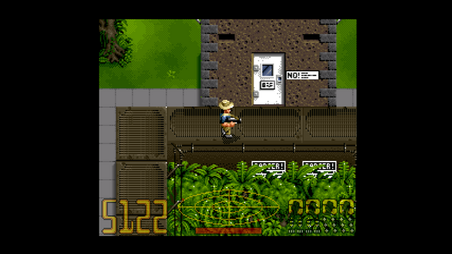 A screenshot of Jurassic Park (originally on SNES, but this being from the classic collection). The view is overhead third-person, and the player is standing at the top of the raptor pen, near the entrance.