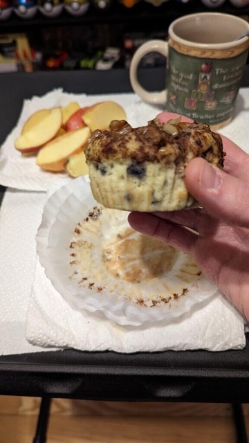 Homemade blueberry nut muffin with some apples slices