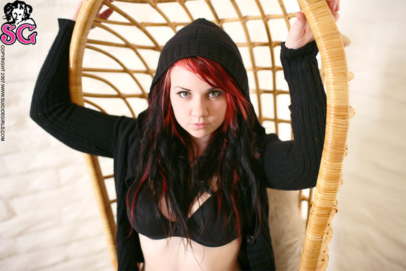 Alt model Quinne posing for the Suicide Girls classic photo set "Bamboo Chair"