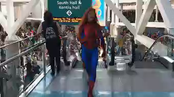 A gif of three talented Spider-Man cosplayers dancing