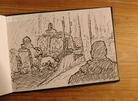 Black Fineliner on paper.

A scene inside a bus. There are two people visibly sitting on busseats. In the foreground, a dark Silhouette indicates a third person.