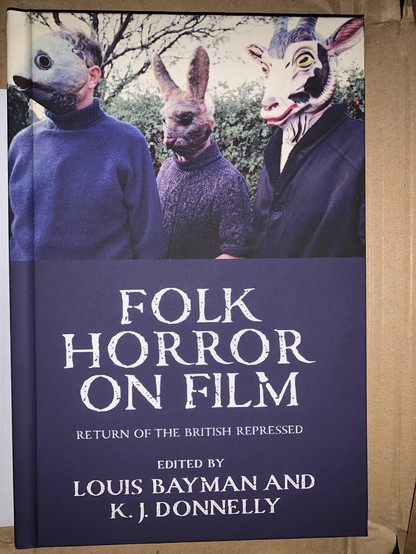 The cover of the book â€œFolk Horror on Filmâ€� edited by Louis Batman and K.J.Donnelly. Three figures in animal masks.