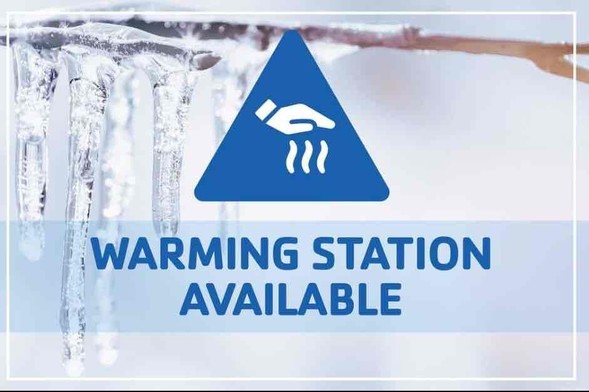 A sign with the words warning station available.