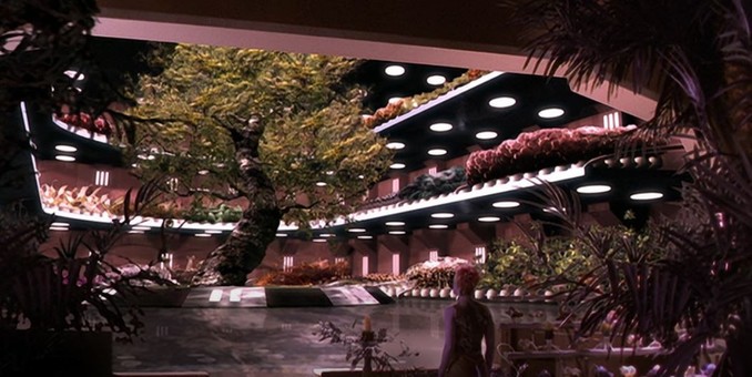 Screenshot of an image from the "Under the Night," the pilot episode of Gene Roddenberry's Andromeda. The image shows one of the characters standing in the foreground and in the background is a large arboretum/greenhouse with a large tree in the center.