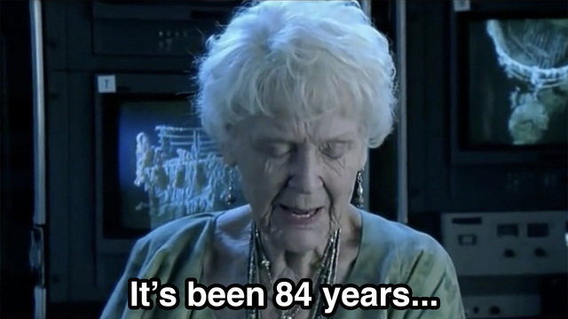 Screenshot from the movie Titanic. Rose, an old woman, looks down and says "It's been 84 years."
