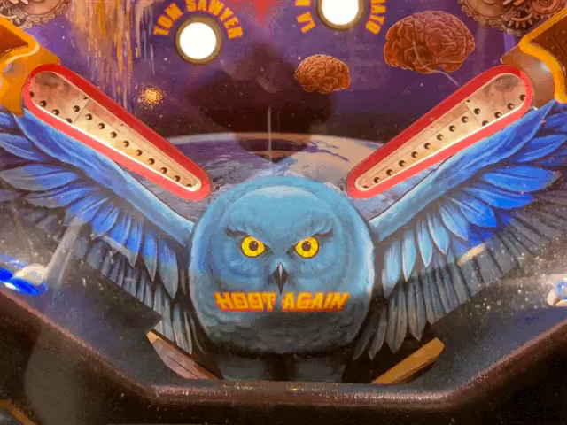 On the Rush pinball machine, there’s the owl inspired by the Fly By Night album cover with blinking eyes above the flippers.