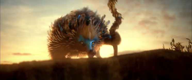 CG animated echidna holding a gnarled walking stick, emerging from somewhere dramatically reminds me of the ShadowJacker the Slut Dragon from Rick & Morty, sans the silicone dildo at the top of the staff (take my word for it, the staff top isn't visible in the screenshot I posted). Actually, don't take my word for it; I don't know for sure if the clip I watched shows whether the staff is adorned or unadorned with Naught Echidna rubber phallus.