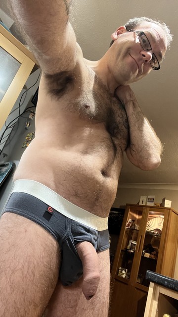 Hairy gay guy showing off his flaccid uncut cock through the horizontal fly of his grey Jack Adams briefs