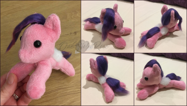 A palm-sized plush of Pipp Petals from MLP G5 with beady eyes and soft, flowing hair