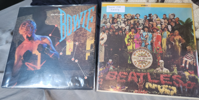 Picture of 2 vinyls, Lets Dance by David Bowie and Sgt. Pepper's Lonely Hearts Club Band by the Beatles