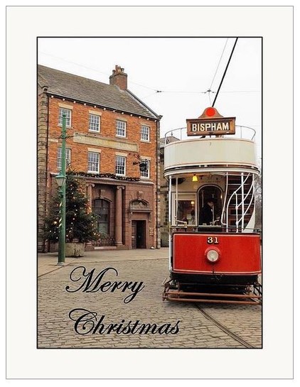 Colour portrait photograph showing a vintage tram stopped on a cobbled road.  The words 'Merry Christmas' have been slapped on the image.  Not that it means anything, in fact, when did Christmas last mean anything?  If you had said to me 20 years ago 'oh in 20 years time hardly anyone will bother sending Christmas cards' I would've disagreed.  If anything the over commercialisation at the time would have made anyone think more cards would be being sent.  But no.  Less cards, but more money spent on crap.
And don't get me started on selection boxes.  When I was little they were a big deal.  OK, for big deal read 'a lazy gift for kids'.  But they were still a something.  Now they're stacked high in supermarkets at .99p a pop.  They mean nothing.  Gifts are just minor guilt trips wrapped in fancy paper.  One of the first things you do on Christmas morning?  Get a bin bag ready for the paper.  Before you know it it's Boxing Day, the house is a mess, and cold (why is the house always cold on Boxing Day).  All you can think of is the work ahead taking all the decorations down.  A couple of weeks later you end up going through that ritual when you're out at the shops, you know - "Hello there, had a nice Christmas?"  "Yes nice and quiet".  Skip forwards what feels like a couple of weeks and you'll be doing it all over again.
My advice?  Go for it.  Why not?  Treat Christmas as though it'll be your last, squeeze every ounce of cheer from the season.  One year it will be.