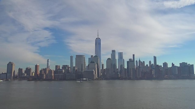This webcam usually shows a view of the New York skyline with the World Trade Center skyscraper showing prominently. It's a clear day. It's 34ºF/1ºC.