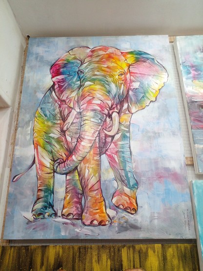 a painting of an elephant, seen from a low perspective, its body a kaleidoscope of colors, the background soft rainbow tones